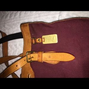 Dooney and Bourke burgundy bucket bag.